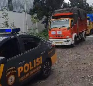 Jamin Keamanan Polresta Malang Kota Kawal Pengiriman Kotak Suara Hingga ke PPS