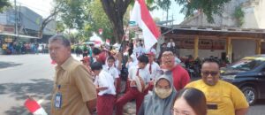 Antusiasme Siswa SDN 1 Rogojampi, Sambut Para Pembalap Tour de Banyuwangi Ijen