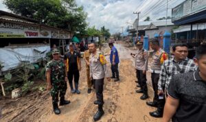 Kolaborasi Polres Kediri Kota, TNI, dan Pemkab Tangani Banjir di Desa Tiron