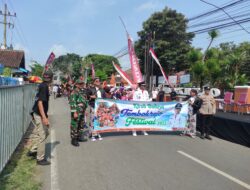 Babinsa Koramil 0825/17 Muncar Produktif Kawal Meriahnya Kirab Budaya Bersih Desa Tembokrejo 2025