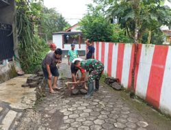 Sinergi TNI dan Warga Kalibaru Kulon: Gotong Royong Perbaiki Drainase untuk Cegah Banjir