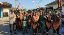 Meriahkan Grebeg Suro, Babinsa Koramil Muncar Dukung Pelestarian Budaya dan Penguatan UMKM Desa Kumendung