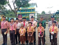 Semangat Pramuka ke-65 Menggema di Bangorejo, Danramil dan Babinsa Kawal Pembinaan Generasi Muda