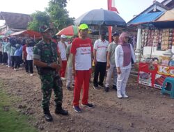 Semarak Maulid Nabi, Babinsa Tegaldlimo Bersama Warga Ikuti Jalan Sehat di Sumberrejo